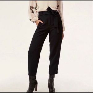 Black high-waisted wide-leg trousers with tie belt